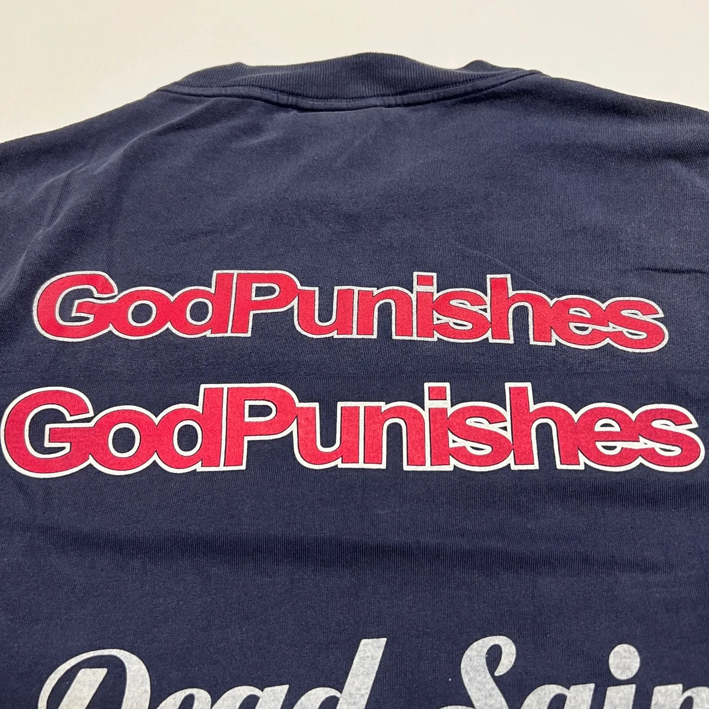 Printing proofing comparison SAINT Mxxxxxx DEAD SAINT SS TEE/NAVY DEAD SAINT printed short sleeves God's punishment TEE Washed blue S-XL Genuine consistent tube weaving without side seams High weight OE yarn fabric Assute dyeing Multiple horse fades Heavy wash water Worn holes Original consistent main mark/wash mark/little angel anti-counterfeiting mark